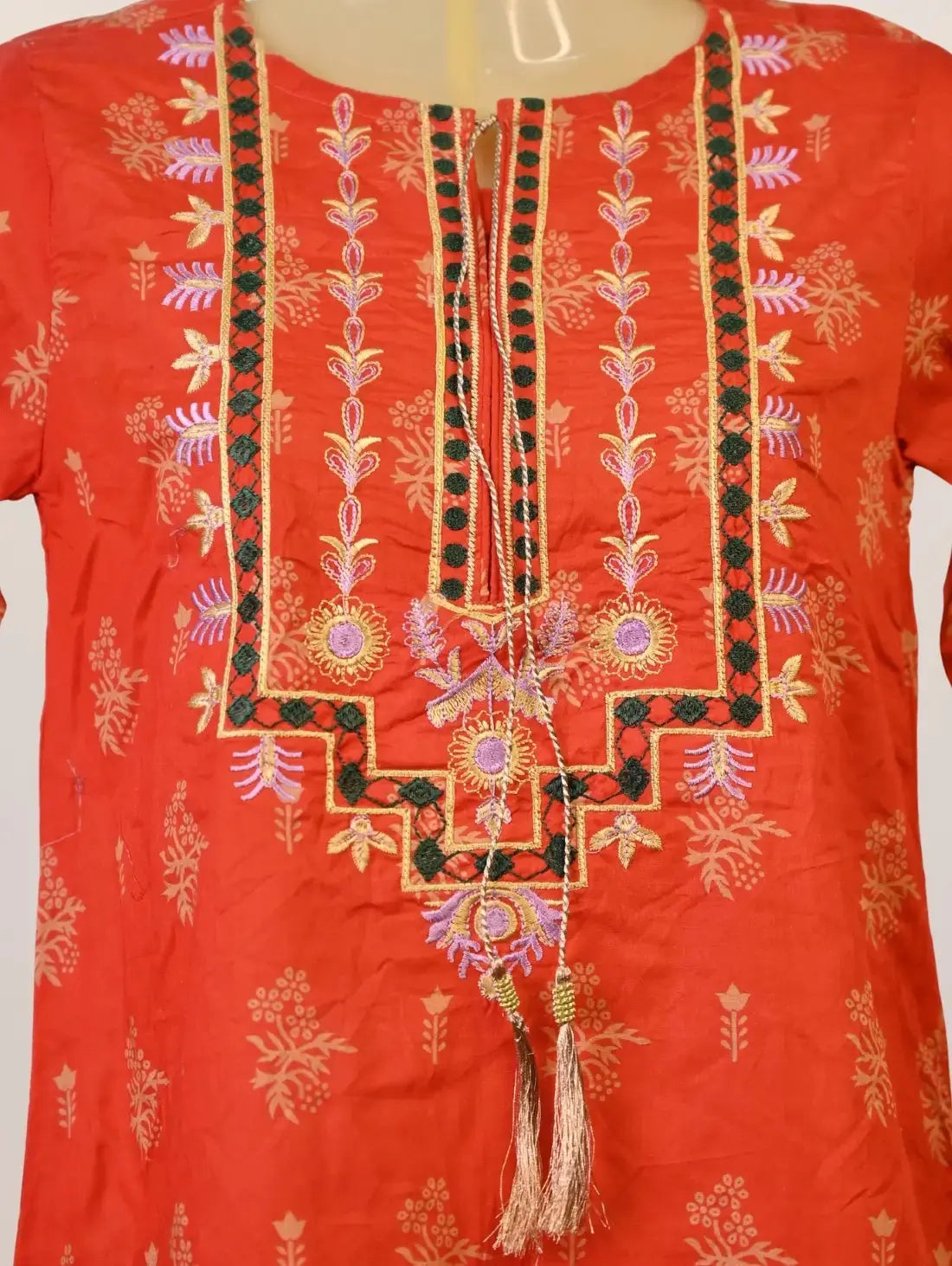 Rust Heritage Kurti with Golden Motifs & Embroidered Tassel Neck