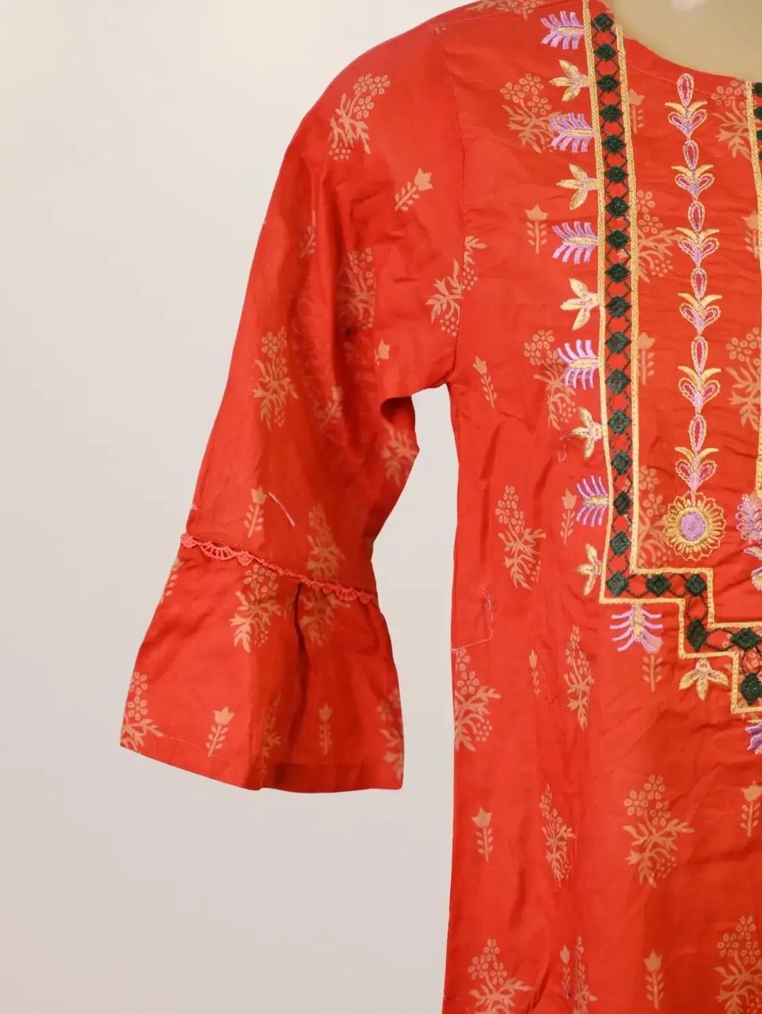 Rust Heritage Kurti with Golden Motifs & Embroidered Tassel Neck